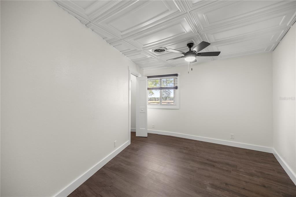 6391 Southeast 186 Terrace Morriston, FL 32668 - Photo 14 of 53 wooden floor in an empty room