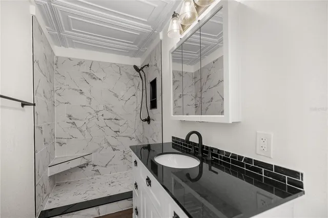 a view of a backyard of the house