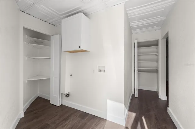 a view of staircase with white walls