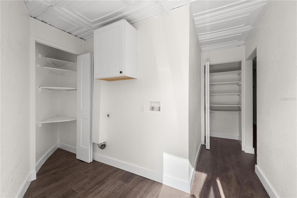 6391 Southeast 186 Terrace Morriston, FL 32668 - Photo 27 of 53 a view of an empty room with wooden floor and a window