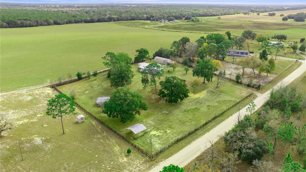 6391 Southeast 186 Terrace Morriston, FL 32668 - Photo 48 of 53 a view of a lake with a yard