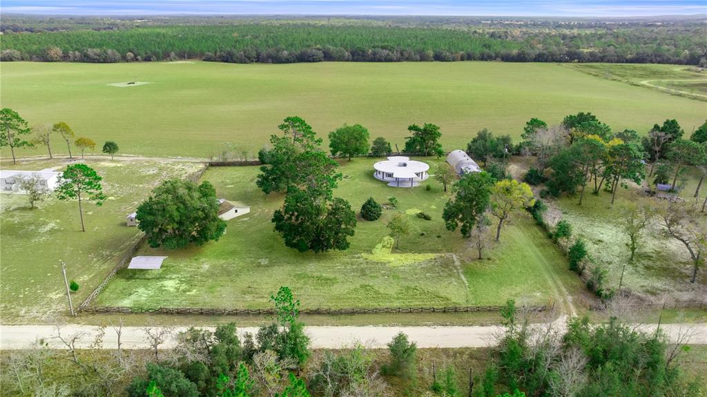 6391 Southeast 186 Terrace Morriston, FL 32668 - Photo 50 of 53 an aerial view of a houses with outdoor space and lake view