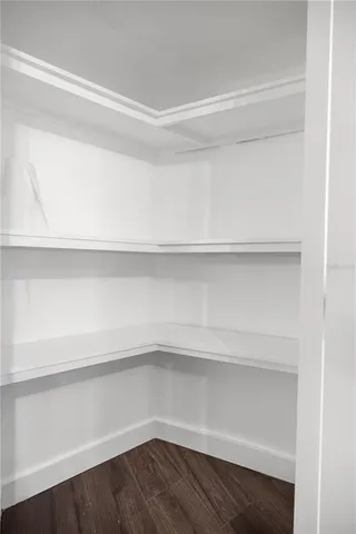 a view of small space with racks on the wall