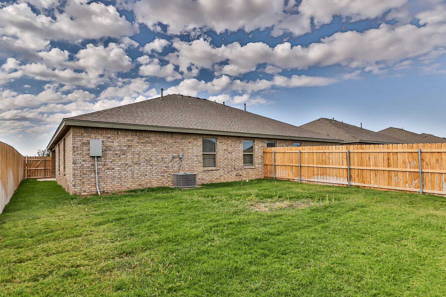 5508 122nd Street Lubbock, TX 79424 - Photo 20 of 20 a view of a house with a yard