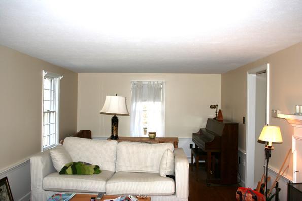 100 Namequoit Road Orleans, MA 02653 - Photo 10 of 13 a living room with furniture a lamp and a window
