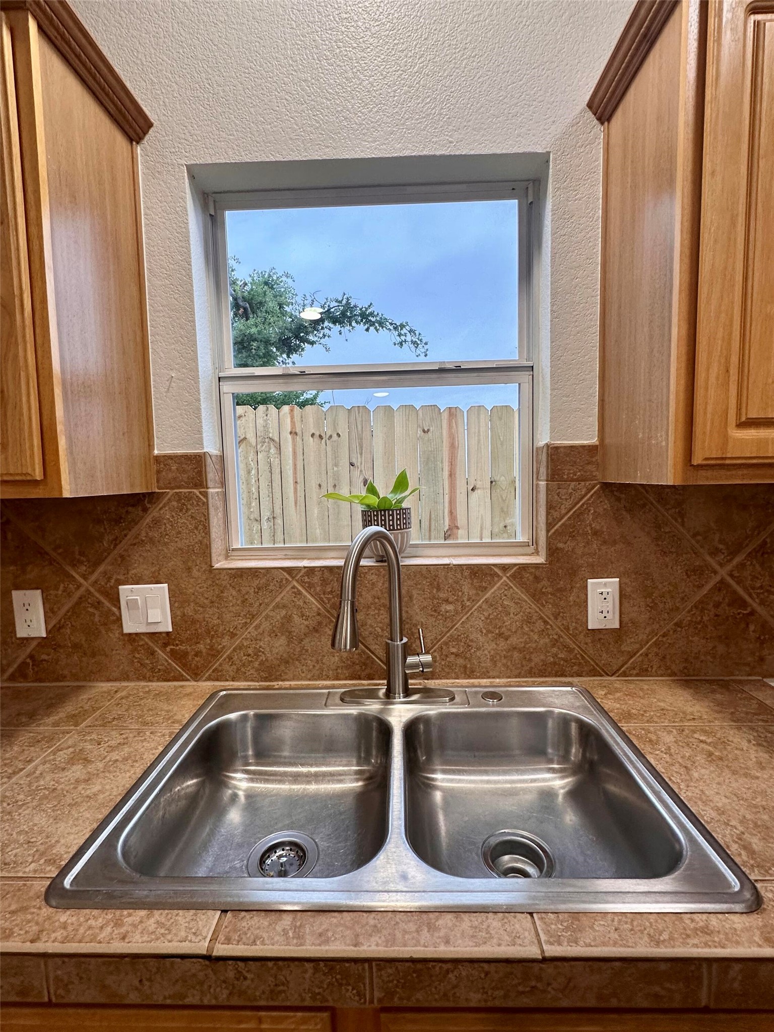 1122 Mansell Avenue Austin, TX 78721 - Photo 7 of 29 a kitchen with a sink and a window