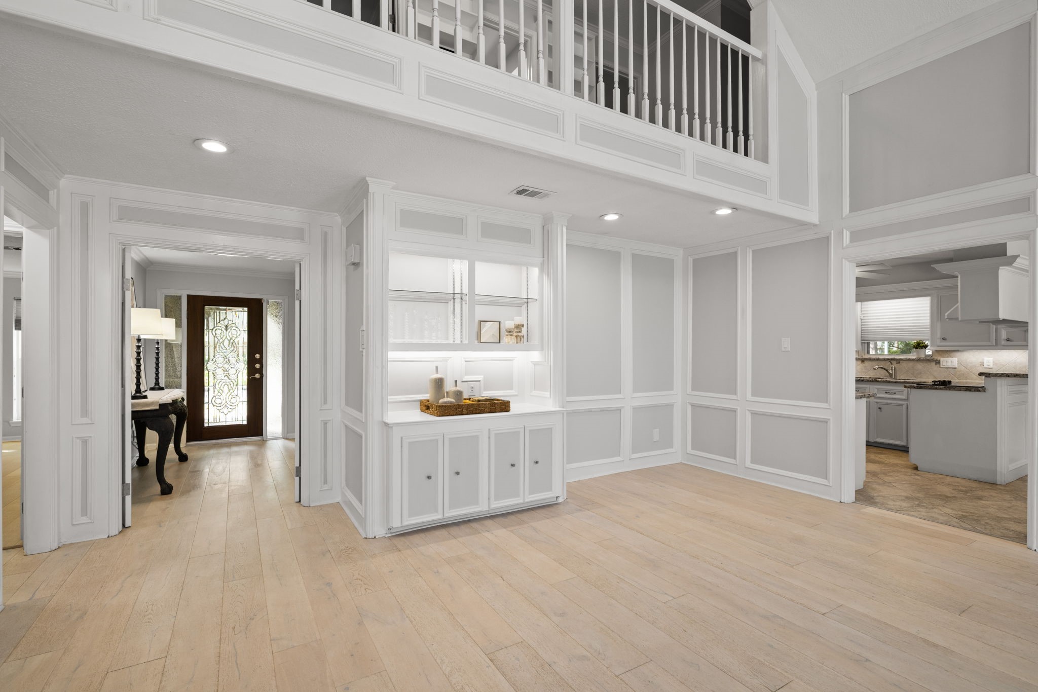 9203 Godstone Lane Spring, TX 77379 - Photo 14 of 49 Recessed LED lighting throughout the home is accented with undercabinet lighting in the bookshelf and kitchen.