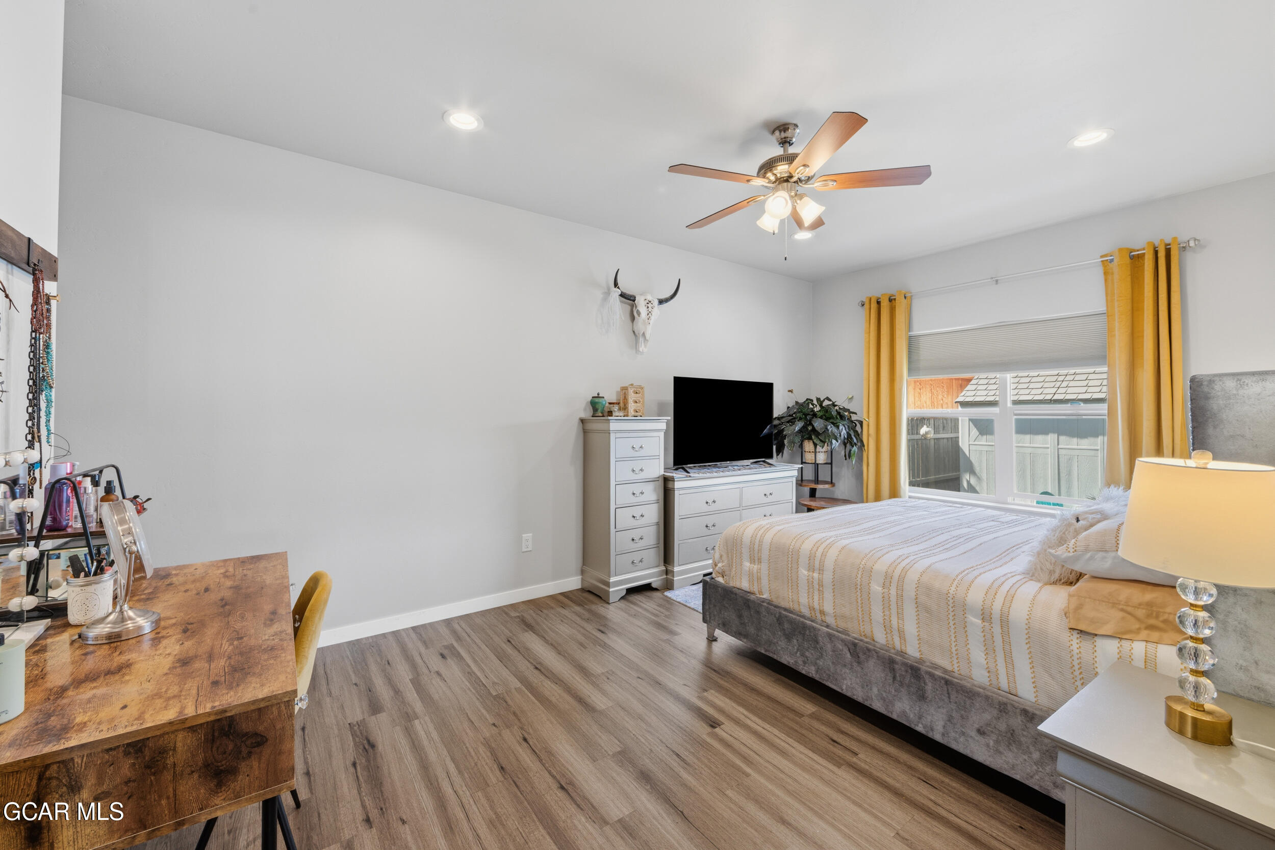 503 12th Street, Unit B Kremmling, CO 80459 - Photo 15 of 44 a bedroom with a bed and a table