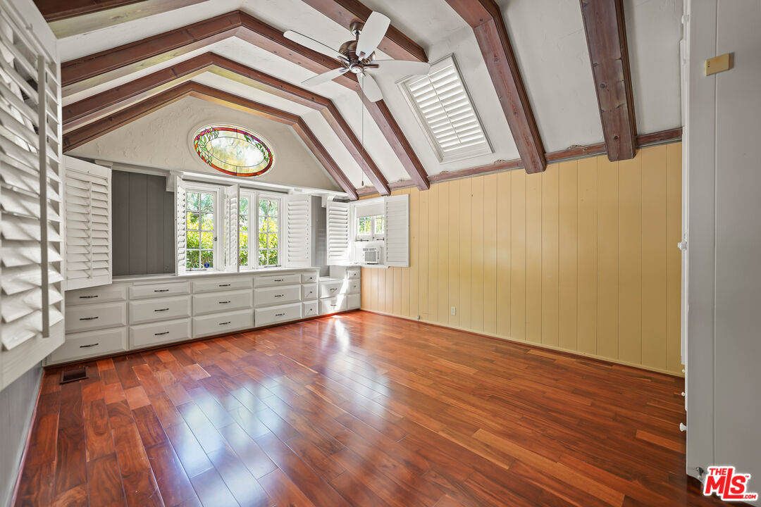 455 El Bosque Laguna Beach, CA 92651 - Photo 16 of 57 a view of an empty room with wooden floor and a window