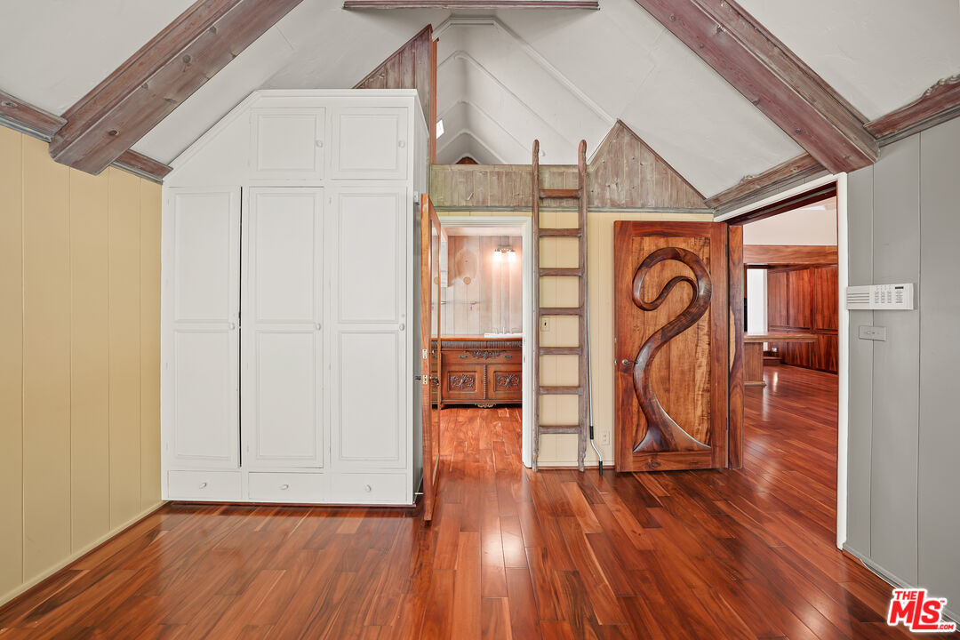 455 El Bosque Laguna Beach, CA 92651 - Photo 19 of 57 a view of a storage & utility room with wooden floor