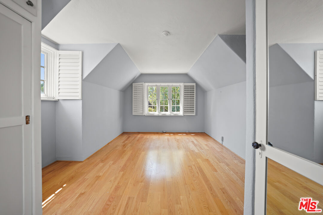 455 El Bosque Laguna Beach, CA 92651 - Photo 30 of 57 a view of an empty room with wooden floor and a window