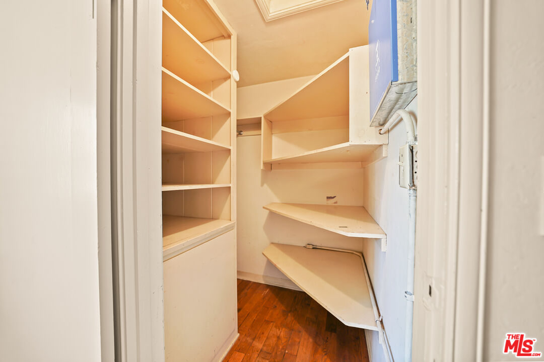 455 El Bosque Laguna Beach, CA 92651 - Photo 33 of 57 a view of walk in closet with empty racks
