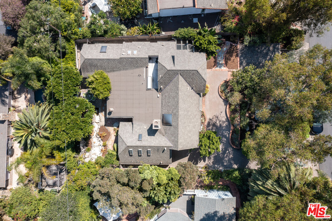 455 El Bosque Laguna Beach, CA 92651 - Photo 47 of 57 an aerial view of a house with a yard and garden