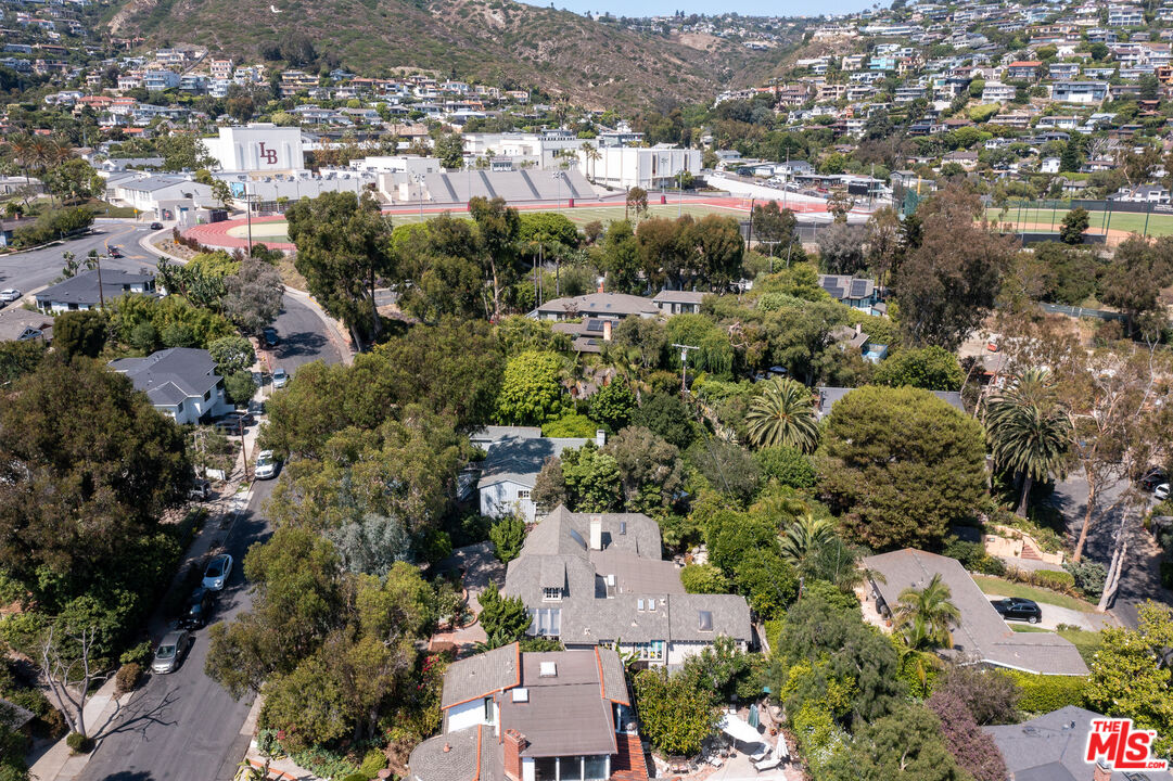 455 El Bosque Laguna Beach, CA 92651 - Photo 50 of 57 an aerial view of residential houses with outdoor space and trees