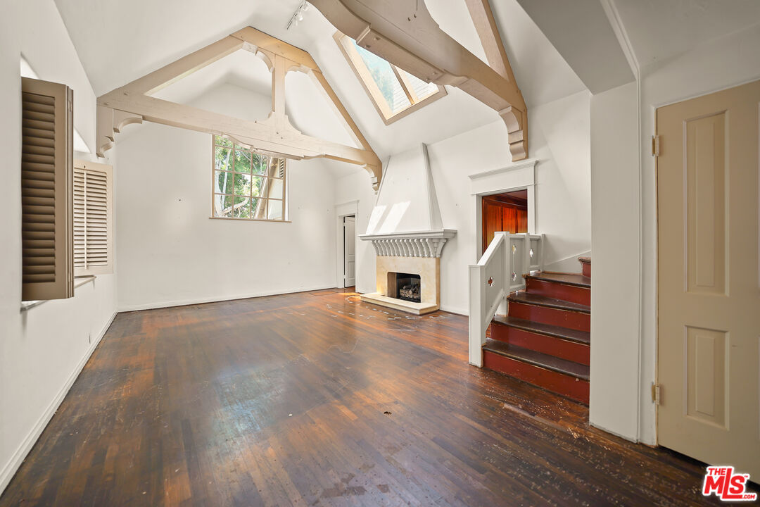 455 El Bosque Laguna Beach, CA 92651 - Photo 5 of 57 a view of entryway and hall with wooden floor