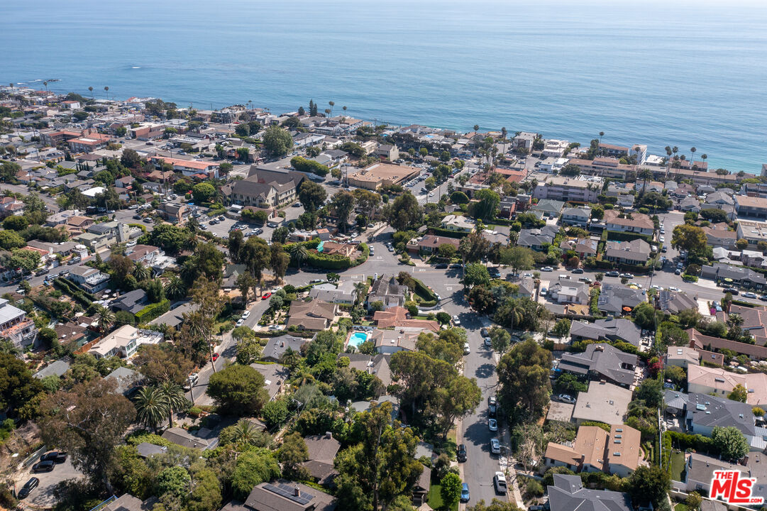 455 El Bosque Laguna Beach, CA 92651 - Photo 53 of 57 an aerial view of a city with ocean view