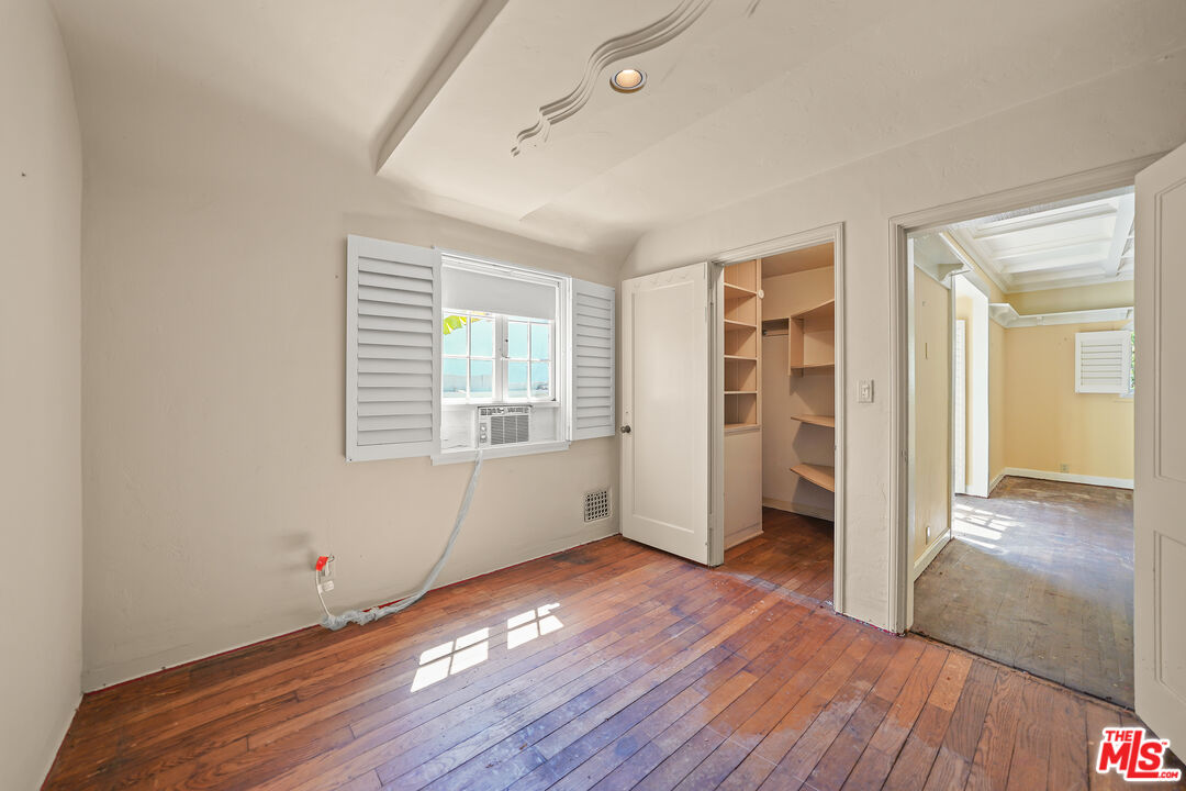 455 El Bosque Laguna Beach, CA 92651 - Photo 8 of 57 wooden floor in an empty room with a window