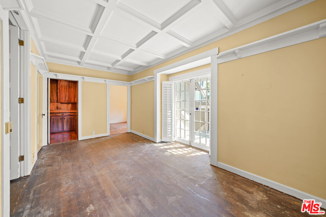 455 El Bosque Laguna Beach, CA 92651 - Photo 9 of 57 a view of empty room with wooden floor