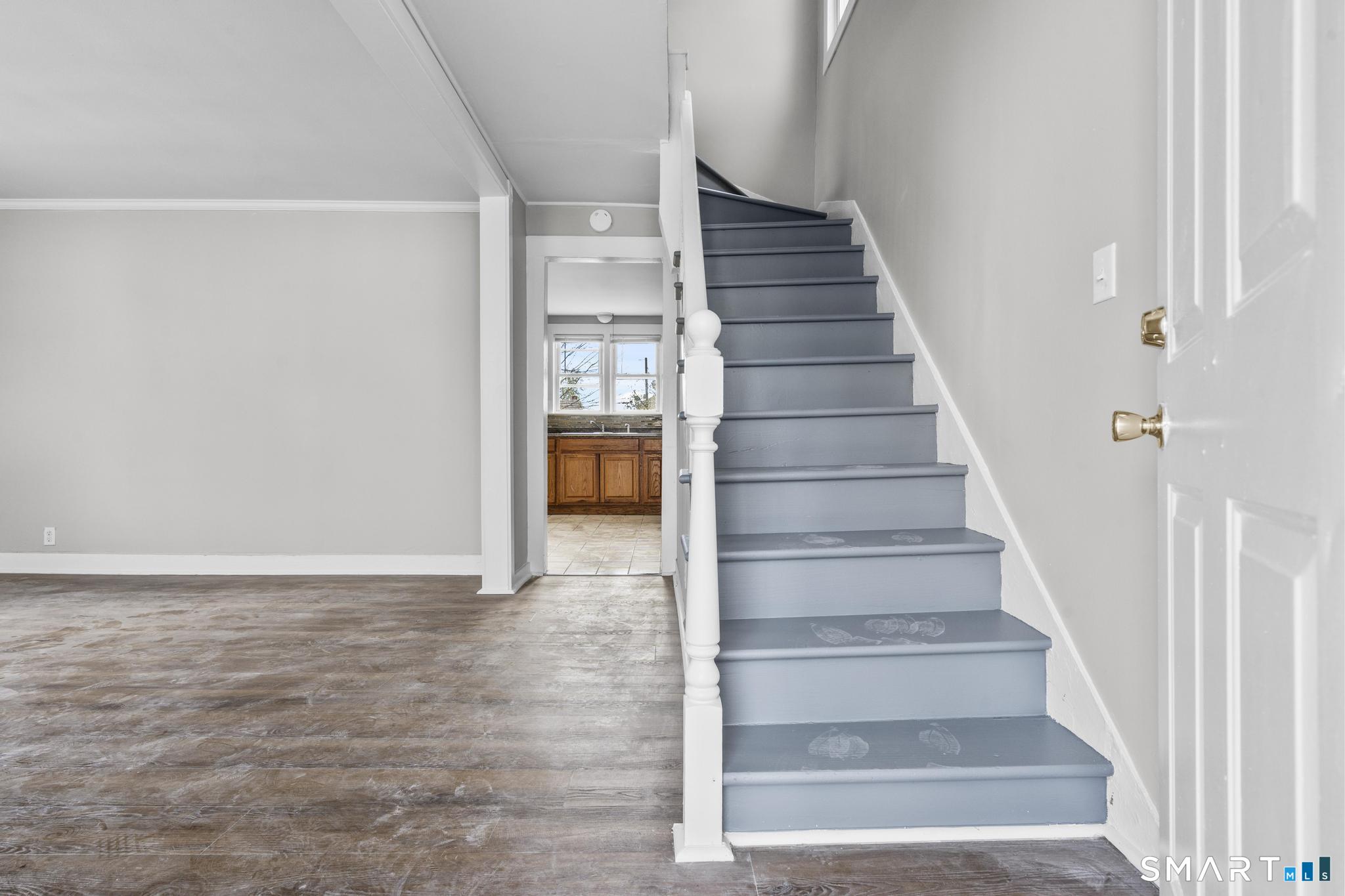 68 Whiting Street Hamden, CT 06514 - Photo 2 of 25 a view of entryway and hall with wooden floor