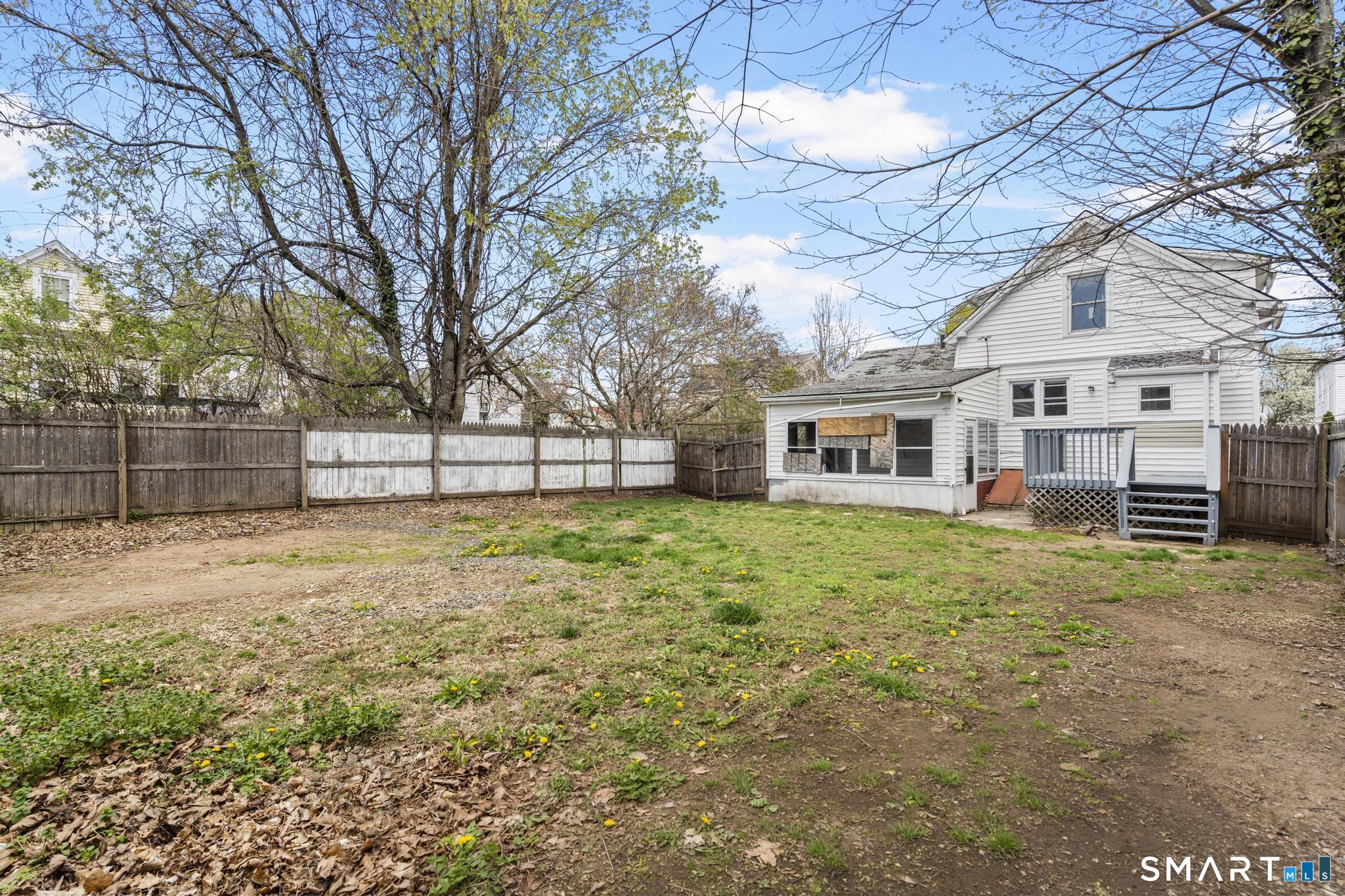68 Whiting Street Hamden, CT 06514 - Photo 23 of 25 a view of a house with a yard