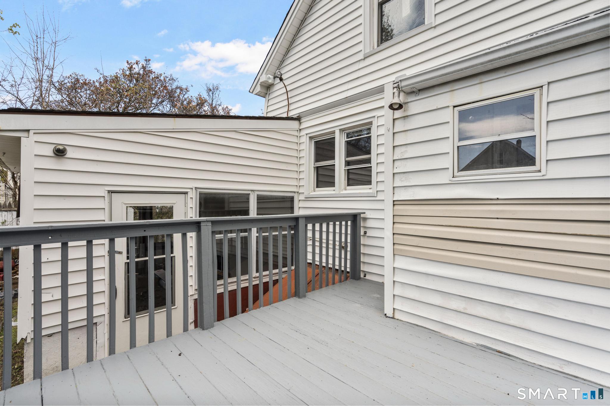 68 Whiting Street Hamden, CT 06514 - Photo 25 of 25 a view of a house with a deck