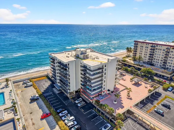 a view of city with ocean