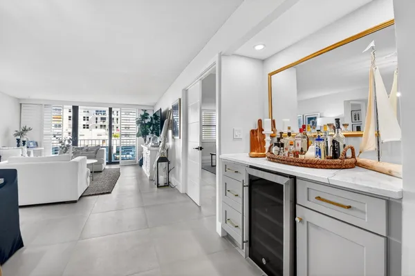 a view of living room and kitchen with furniture