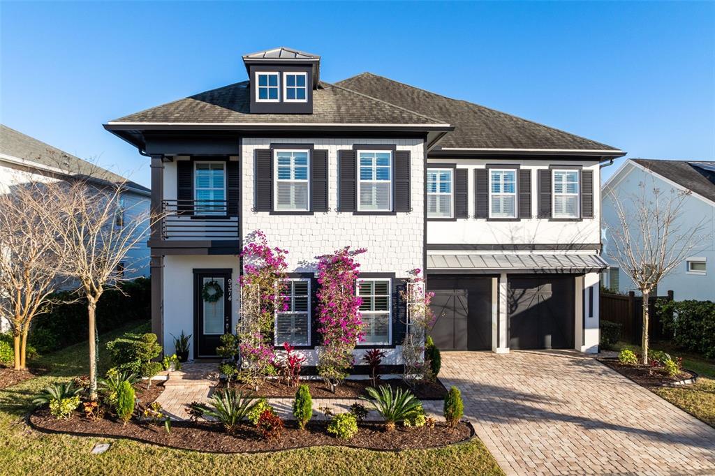 a front view of a house with yard