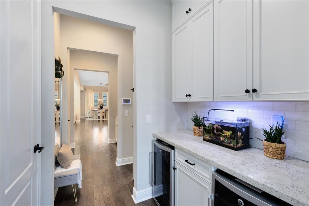 9374 Reymont Street Orlando, FL 32827 - Photo 30 of 54 a kitchen with a sink and cabinets