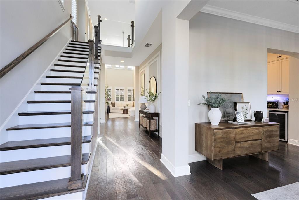 9374 Reymont Street Orlando, FL 32827 - Photo 3 of 54 a living room with furniture and wooden floor