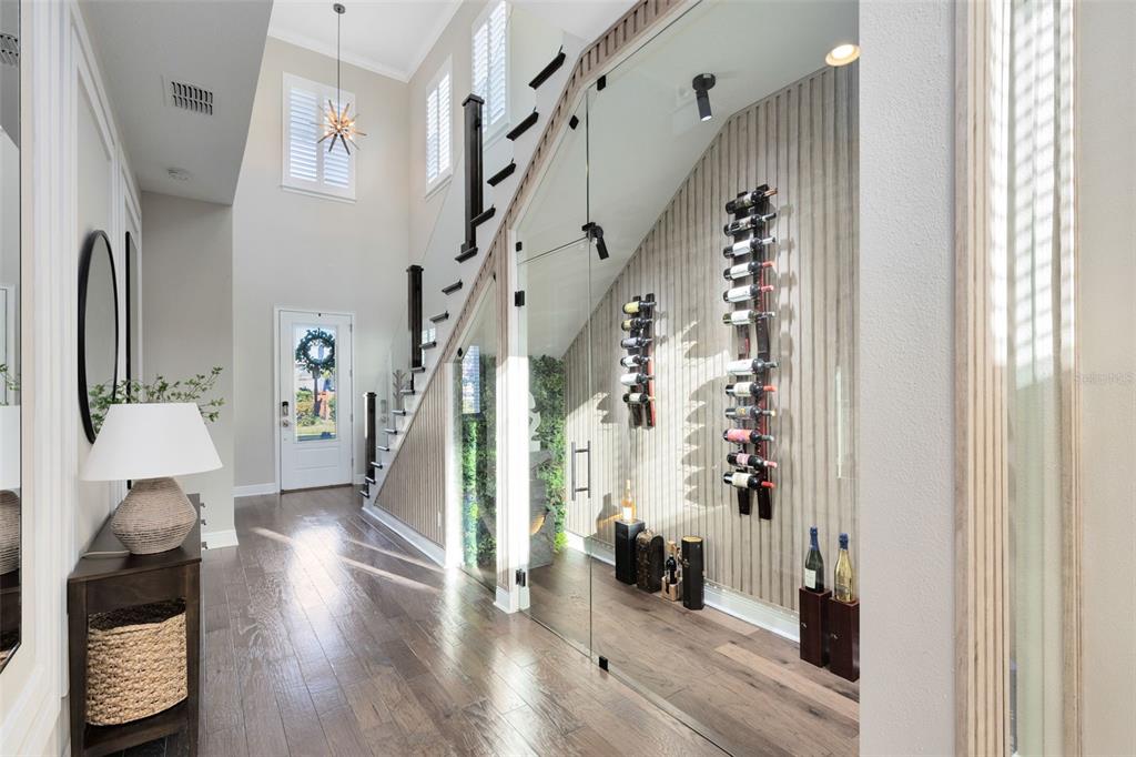 9374 Reymont Street Orlando, FL 32827 - Photo 4 of 54 a view of an entryway with wooden floor
