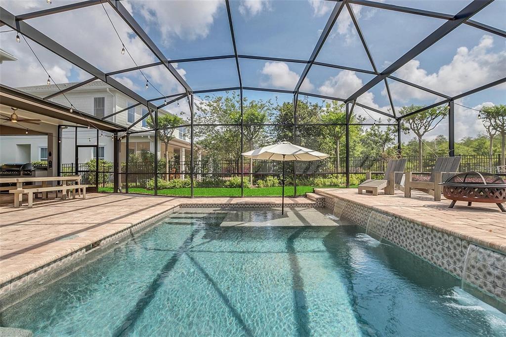 9374 Reymont Street Orlando, FL 32827 - Photo 44 of 54 a view of yard with patio