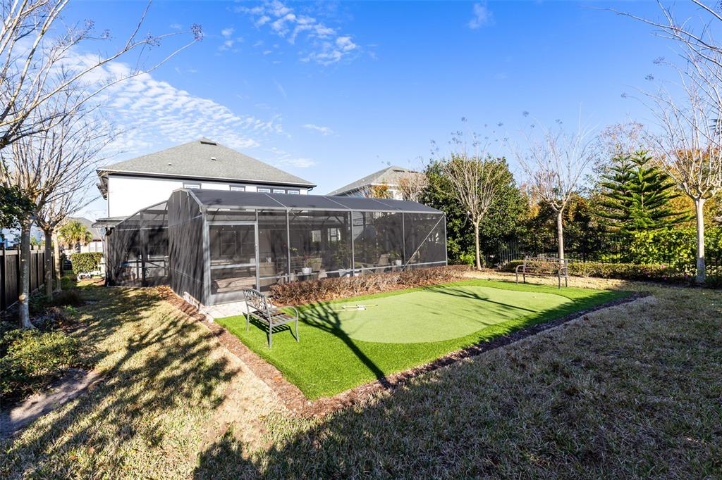9374 Reymont Street Orlando, FL 32827 - Photo 45 of 54 a view of a house with swimming pool and sitting area