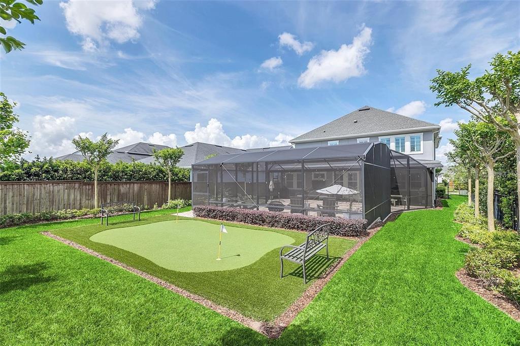 9374 Reymont Street Orlando, FL 32827 - Photo 47 of 54 a view of a backyard with a garden and plants