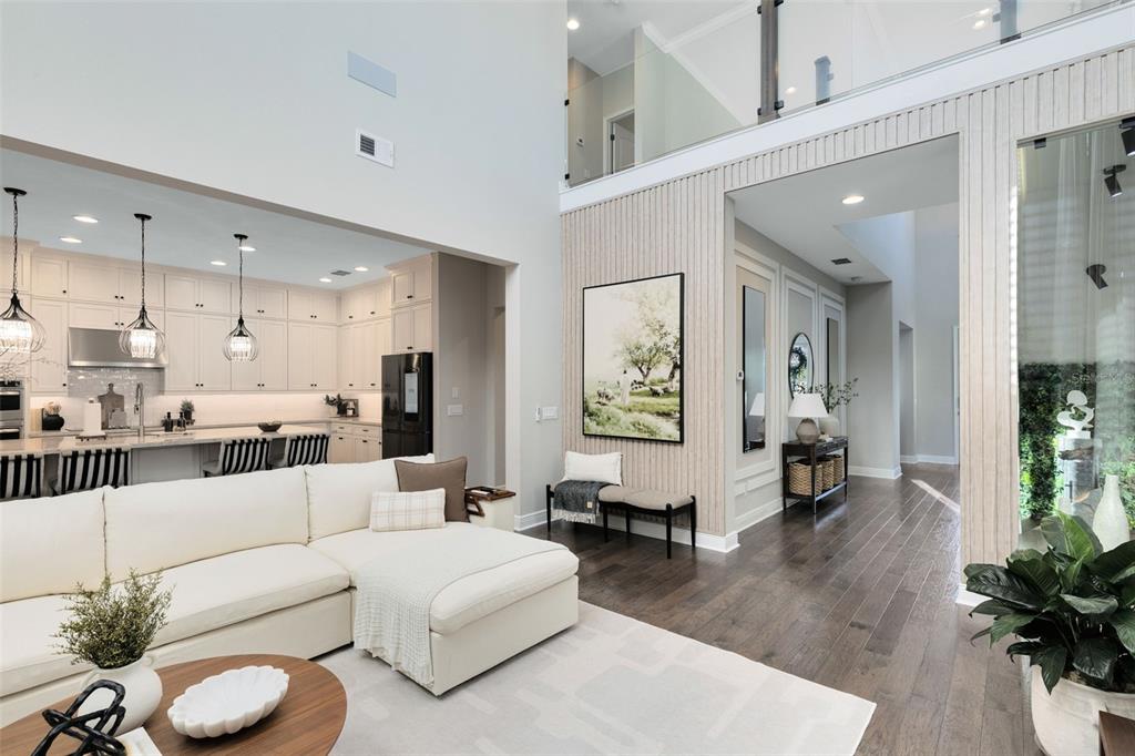 9374 Reymont Street Orlando, FL 32827 - Photo 5 of 54 a living room with furniture and a large window