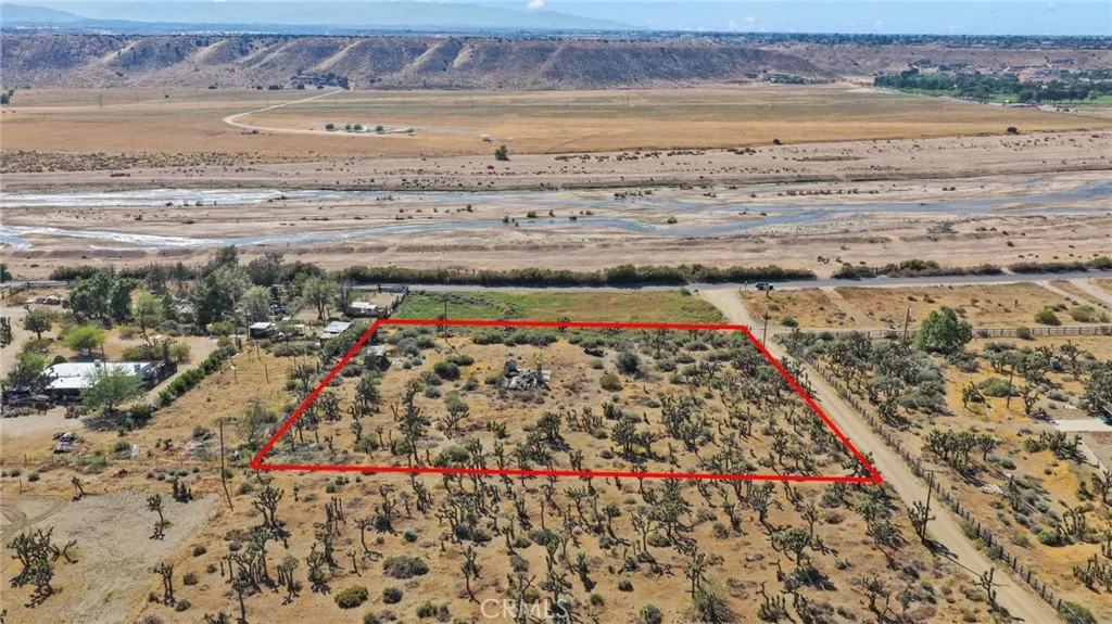 1 Lamprey Road Apple Valley, CA 92308 - Photo 2 of 9 a view of water heater and covered with wooden floor