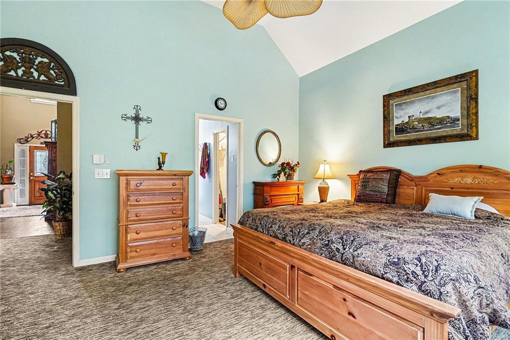 174 Senators Ridge Drive Dallas, GA 30132 - Photo 15 of 26 a bed room with a bed and dresser