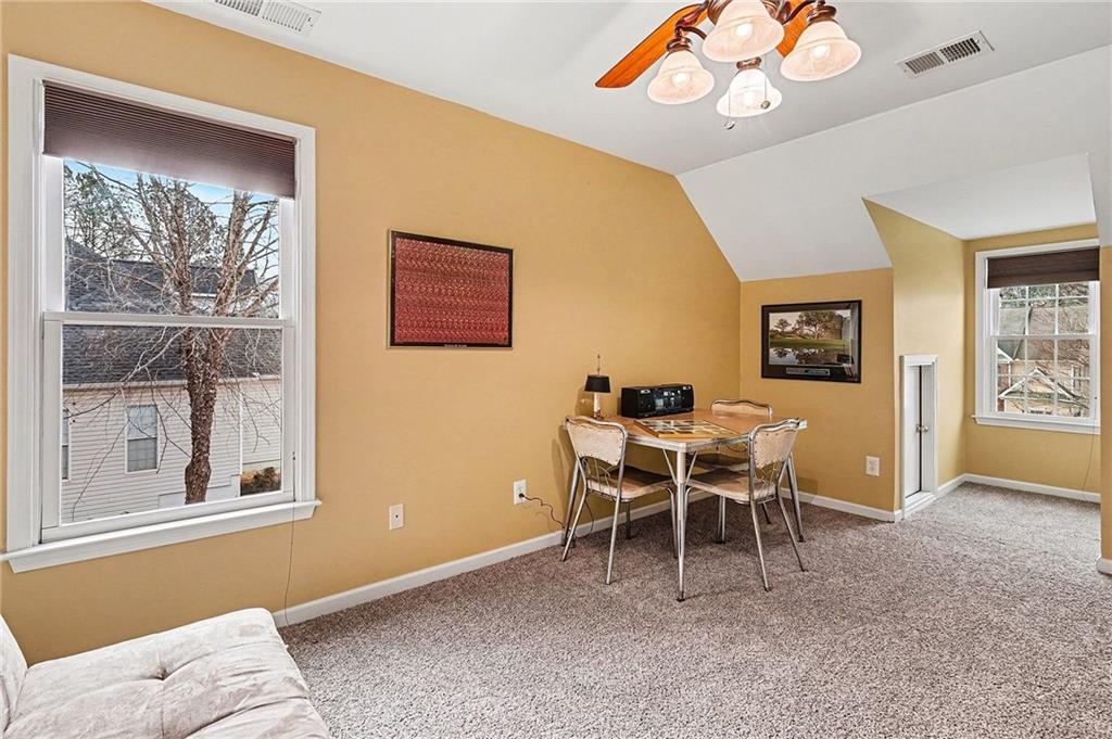 174 Senators Ridge Drive Dallas, GA 30132 - Photo 20 of 26 a dining room with furniture and window
