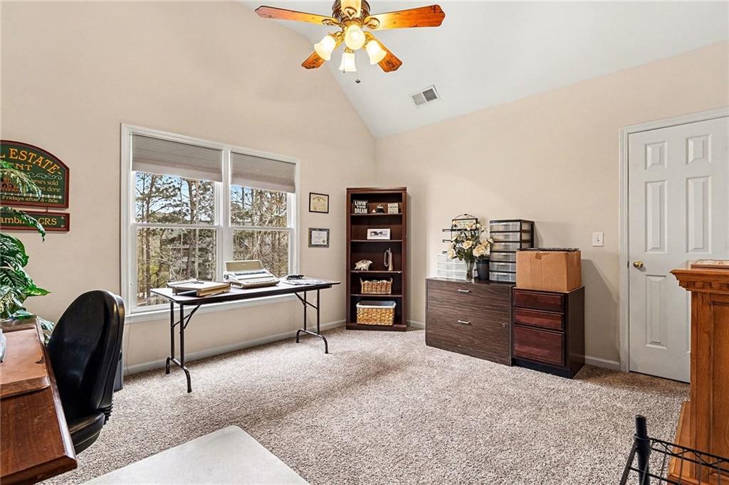 174 Senators Ridge Drive Dallas, GA 30132 - Photo 21 of 26 a living room with furniture and wooden floor