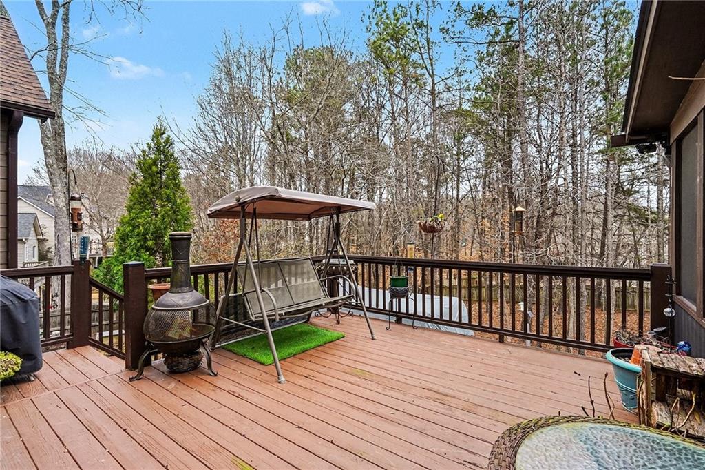 174 Senators Ridge Drive Dallas, GA 30132 - Photo 25 of 26 a view of a deck with furniture and a yard