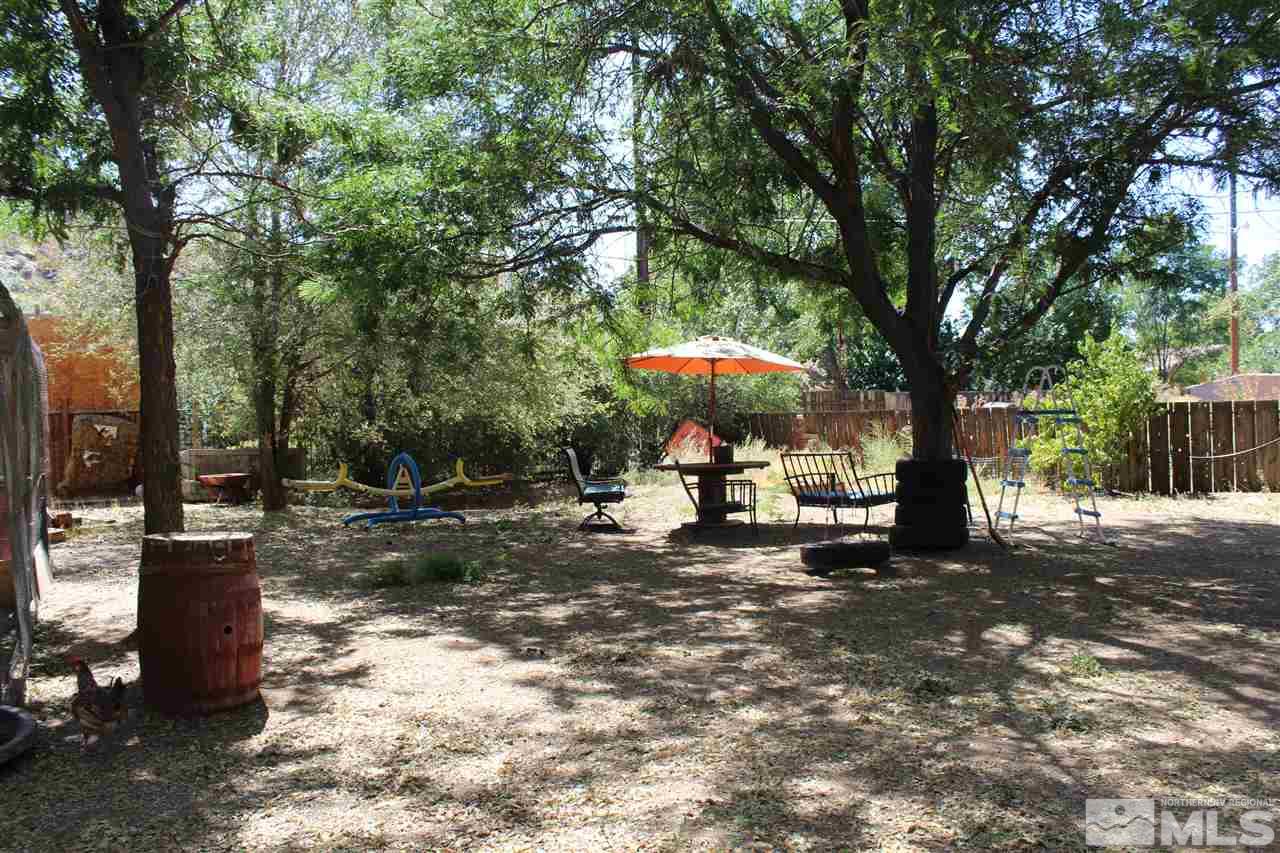 9190 Fremont Way Reno, NV 89506 - Photo 7 of 8 a view of a park with large trees
