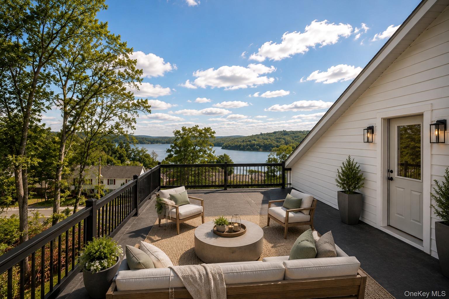 133 West Mombasha Road Monroe, NY 10950 - Photo 4 of 47 a view of a patio with couches potted plants and sky view