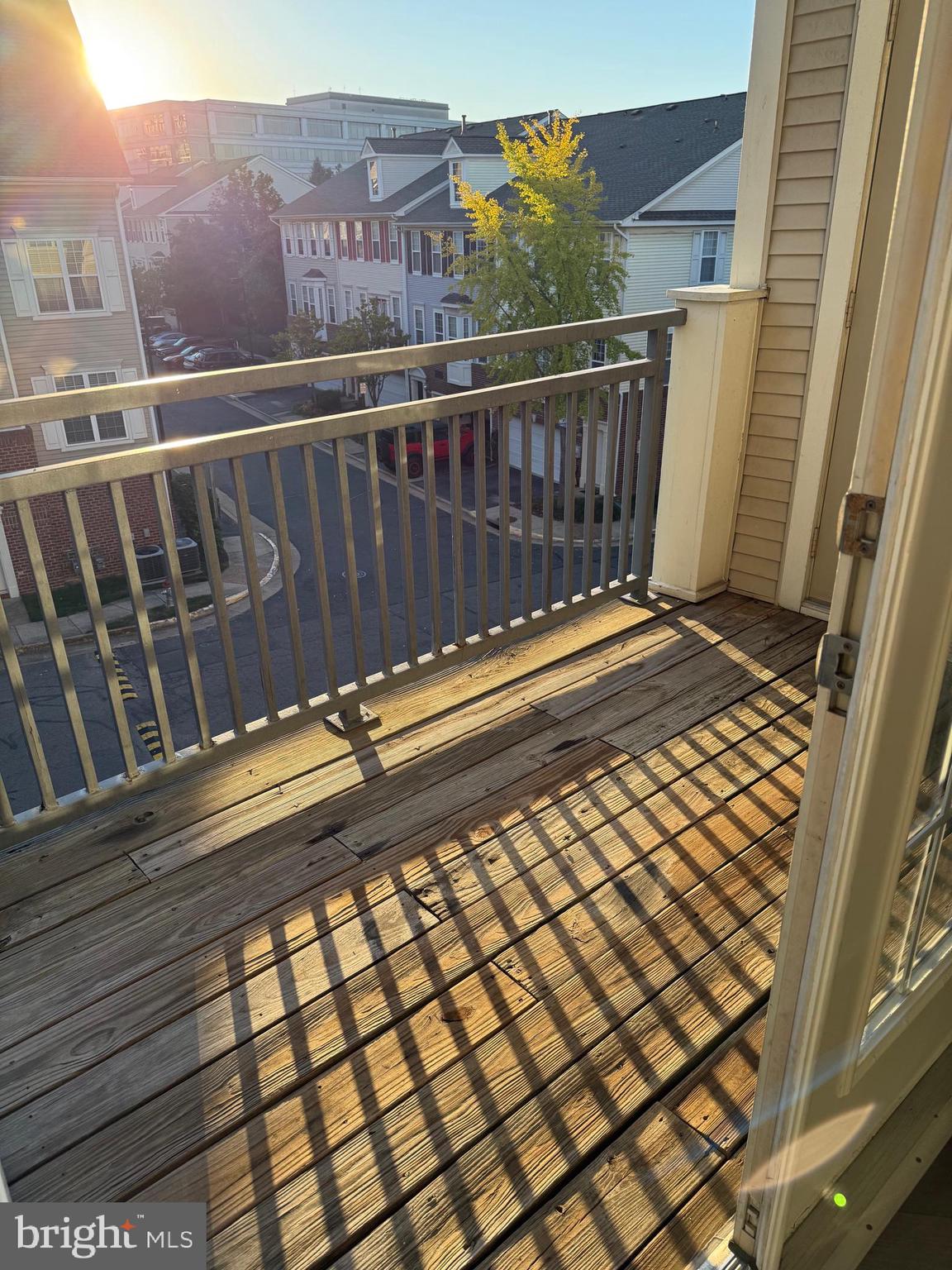 3009 Nicosh Circle, Unit 4302 Falls Church, VA 22042 - Photo 22 of 32 a view of a balcony with wooden floor