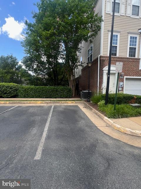 3009 Nicosh Circle, Unit 4302 Falls Church, VA 22042 - Photo 25 of 32 a view of a street with a house