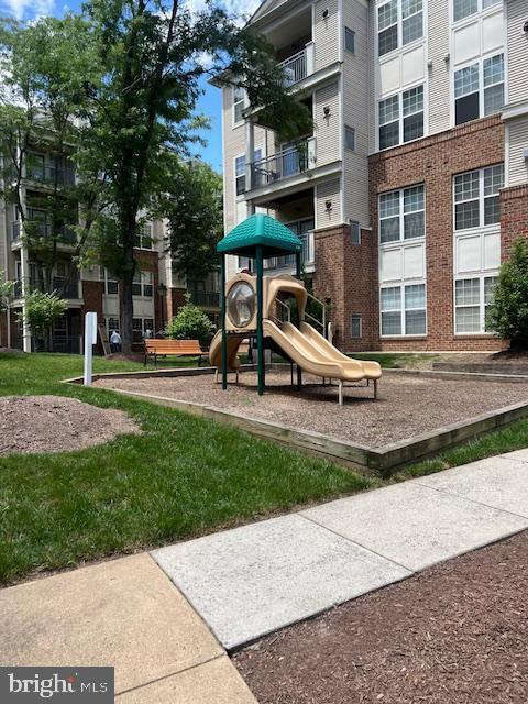 3009 Nicosh Circle, Unit 4302 Falls Church, VA 22042 - Photo 26 of 32 a view of a park with bench