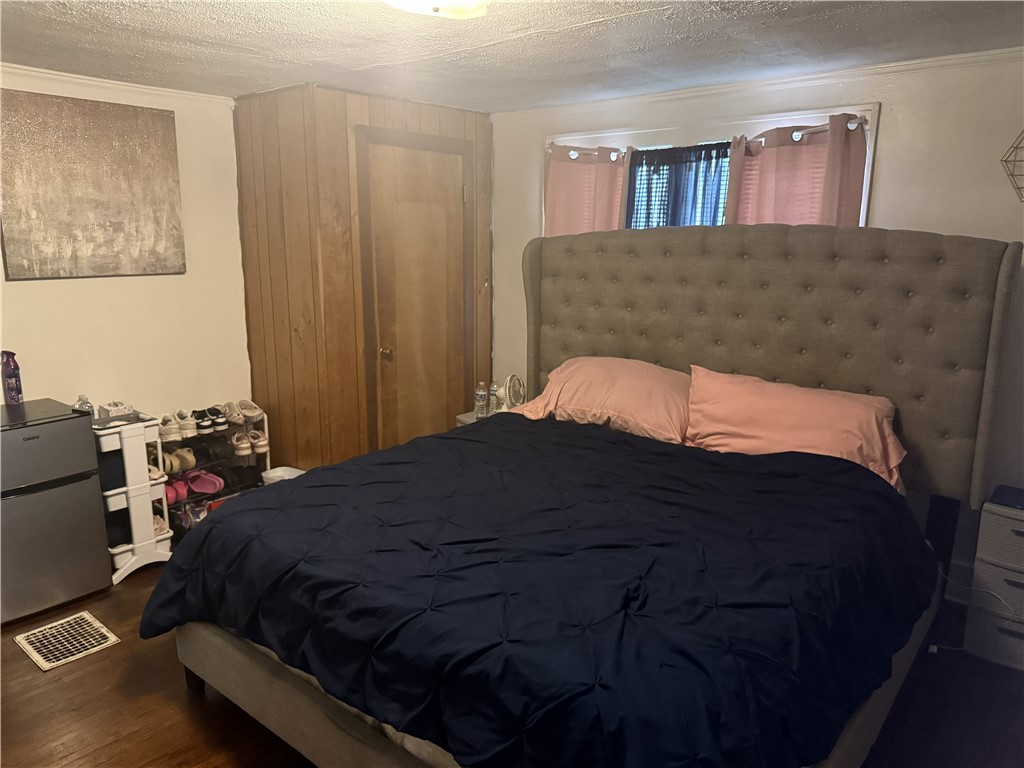 417 South Seigel Street Decatur, IL 62522 - Photo 10 of 11 a bedroom with a bed and a window