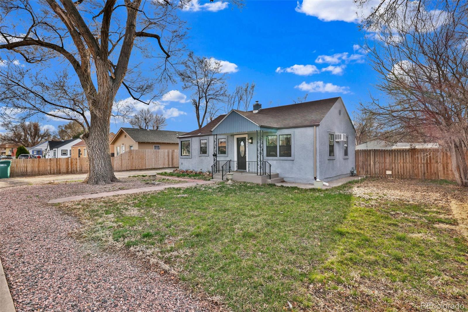 2411 Wyoming Avenue Pueblo, CO 81004 - Photo 1 of 25 a view of a house with a yard