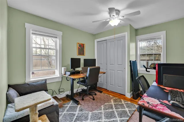 a workspace with furniture and a window