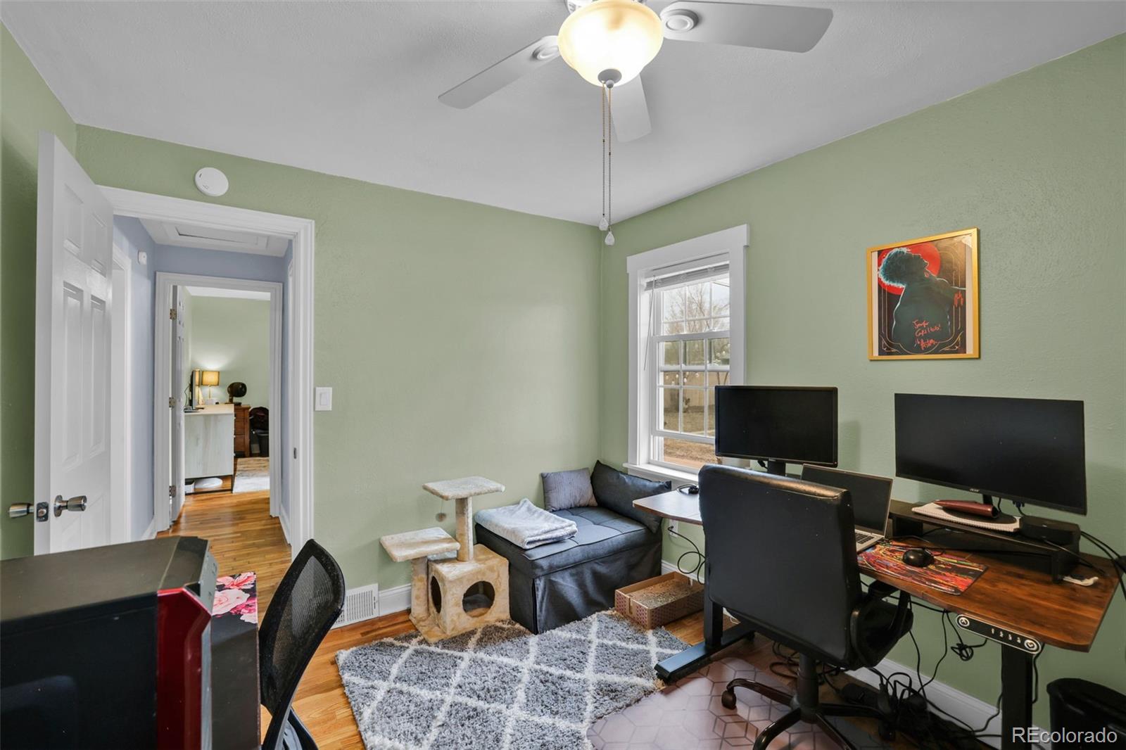 2411 Wyoming Avenue Pueblo, CO 81004 - Photo 16 of 25 a view of a workspace with furniture and a window