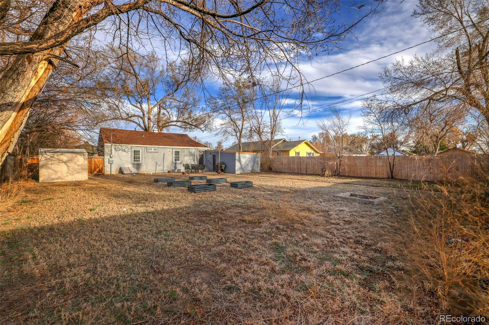 2411 Wyoming Avenue Pueblo, CO 81004 - Photo 18 of 25 a view of yard with outdoor seating